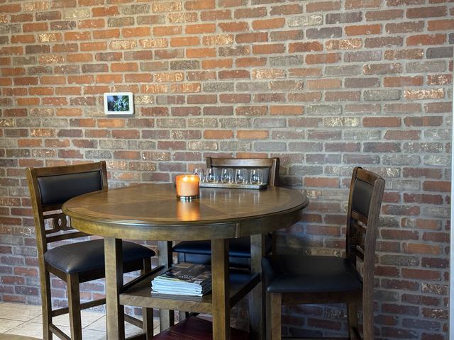 Brick veneer dining room wall