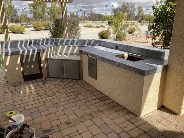 Outdoor kitchen on a paver patio